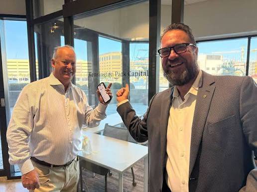 Mark Cleveland with a colleague at the Kensington Park Capital office