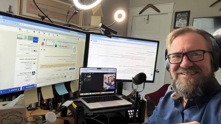 Mark Cleveland recording the Parallel Entrepreneur Podcast at his multi-screen studio desk
